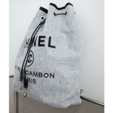 CHANEL 샤넬 도빌 가죽 트리밍 라피아 백팩