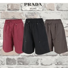 PRADA 프라다 리벳 나일론 와이드 반팬츠